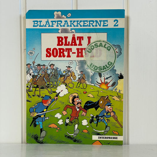 Blåfrakkerne 2 Blåt i Sort - hvid - Mission Afrika Genbrug