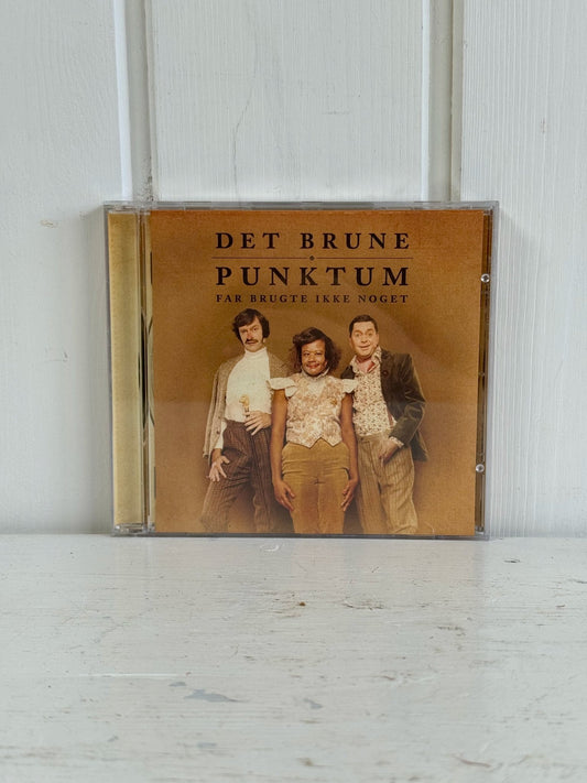 Det Brune Punktum: Far Brugte Ikke Noget (CD) - Mission Afrika Genbrug
